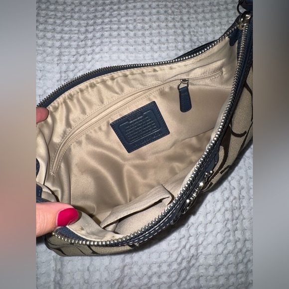 Coach Park Khaki Blue Leather Signature Duffle
Shoulder Bag